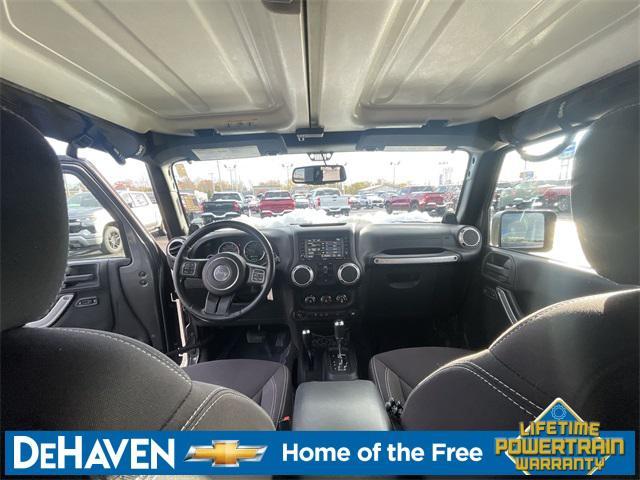 used 2014 Jeep Wrangler Unlimited car, priced at $13,677