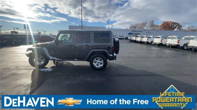 used 2014 Jeep Wrangler Unlimited car, priced at $13,677