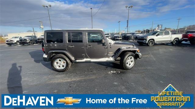 used 2014 Jeep Wrangler Unlimited car, priced at $13,677