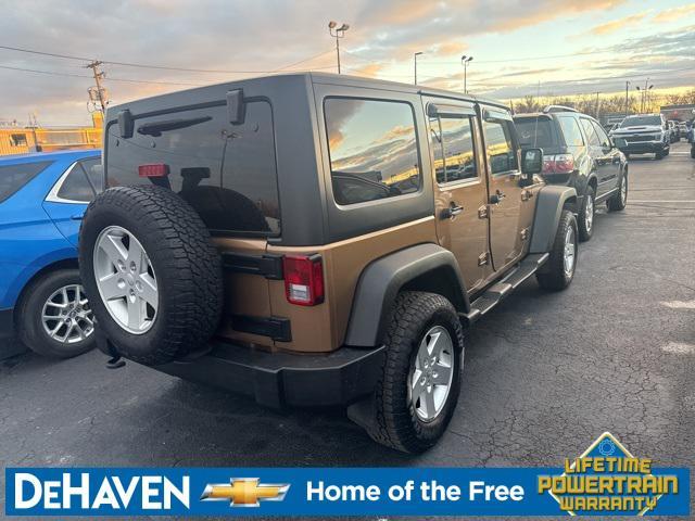 used 2015 Jeep Wrangler Unlimited car, priced at $13,324