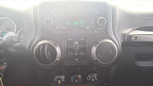 used 2014 Jeep Wrangler Unlimited car, priced at $18,599