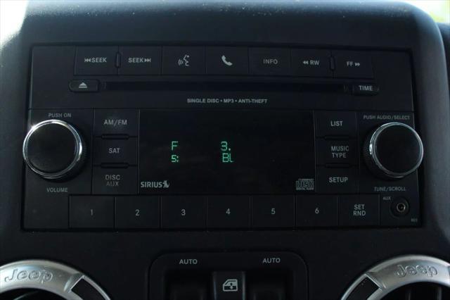 used 2015 Jeep Wrangler Unlimited car, priced at $16,999