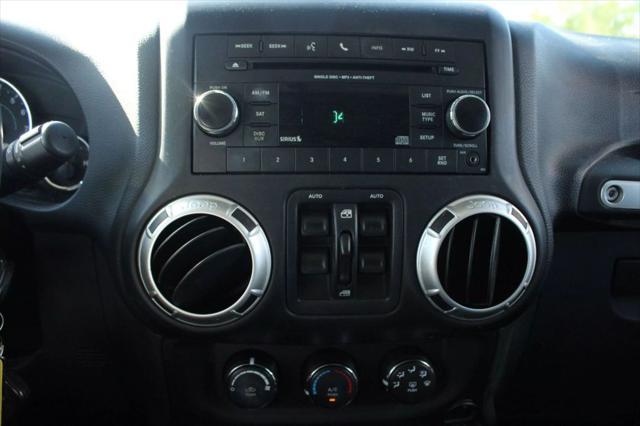 used 2015 Jeep Wrangler Unlimited car, priced at $16,999