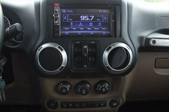 used 2015 Jeep Wrangler Unlimited car, priced at $18,999