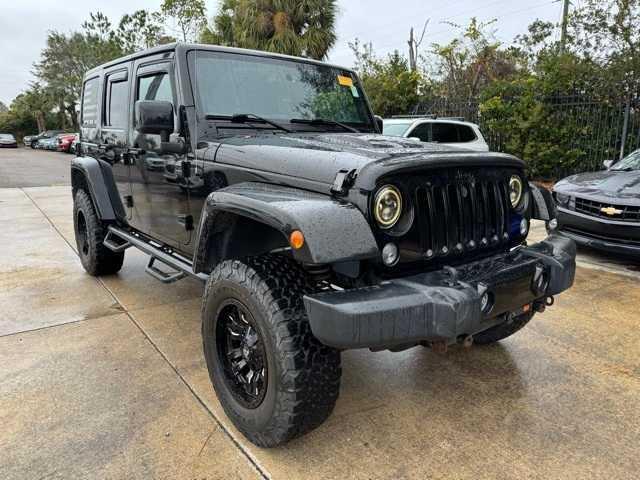 used 2015 Jeep Wrangler Unlimited car, priced at $20,576