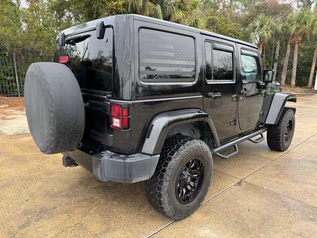 used 2015 Jeep Wrangler Unlimited car, priced at $20,576