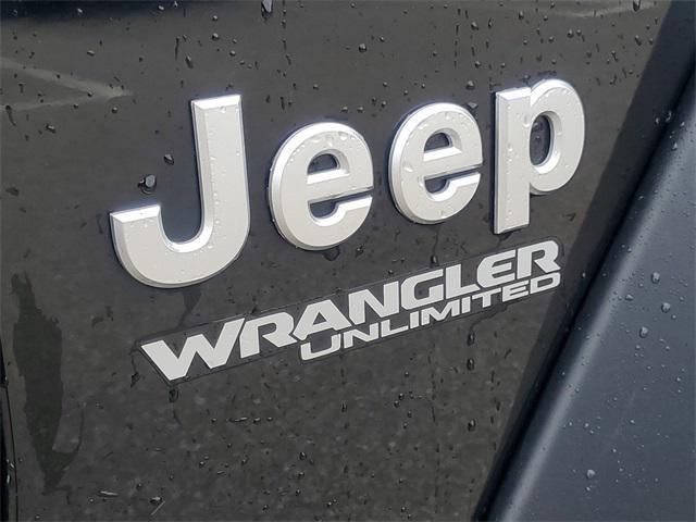 used 2021 Jeep Wrangler Unlimited car, priced at $31,895