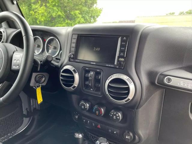 used 2015 Jeep Wrangler Unlimited car, priced at $13,880