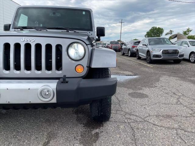 used 2015 Jeep Wrangler Unlimited car, priced at $13,880