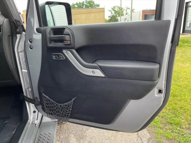 used 2015 Jeep Wrangler Unlimited car, priced at $13,880