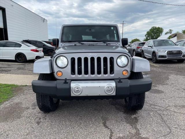used 2015 Jeep Wrangler Unlimited car, priced at $13,880