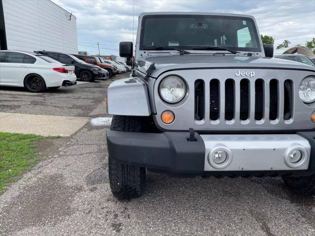 used 2015 Jeep Wrangler Unlimited car, priced at $13,880