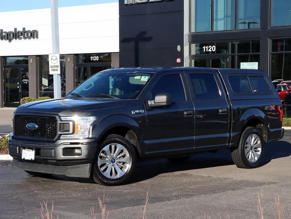 used 2018 Ford F-150 car, priced at $23,140