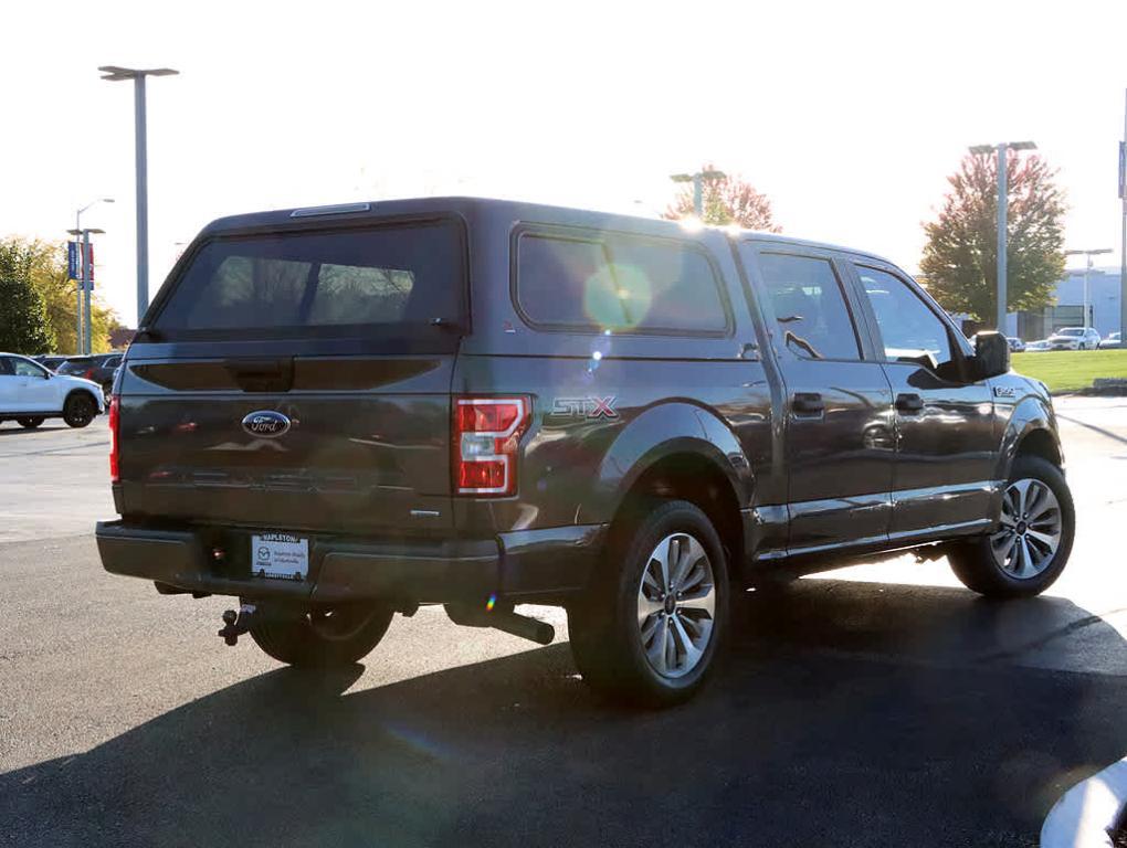 used 2018 Ford F-150 car, priced at $23,140