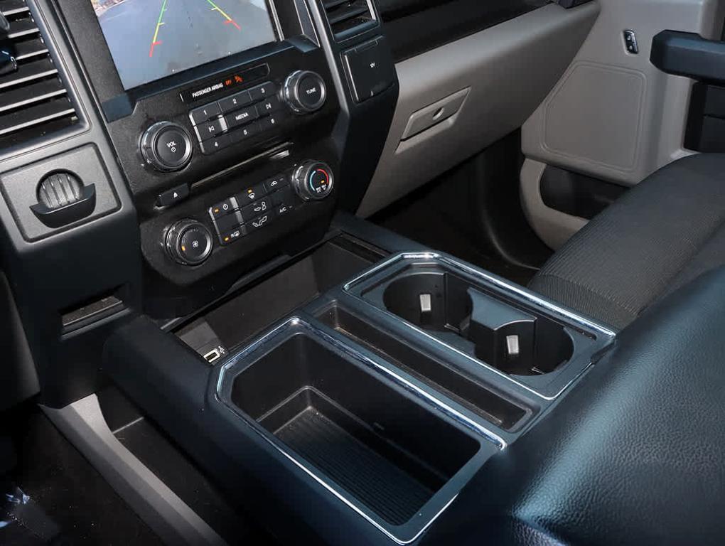 used 2018 Ford F-150 car, priced at $23,140