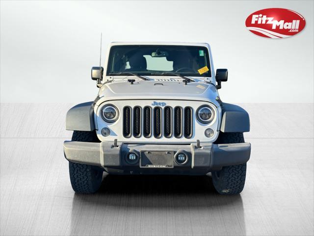 used 2015 Jeep Wrangler Unlimited car, priced at $21,388