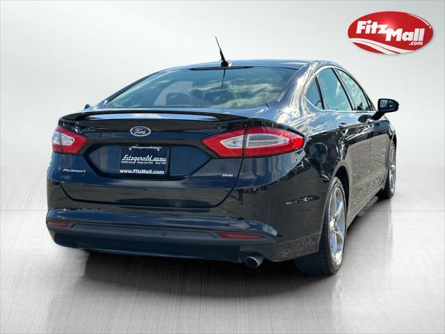 used 2016 Ford Fusion car, priced at $9,988