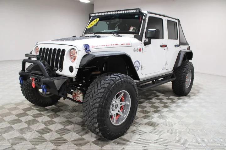 used 2014 Jeep Wrangler Unlimited car, priced at $25,000
