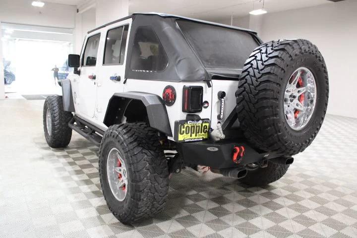 used 2014 Jeep Wrangler Unlimited car, priced at $25,000