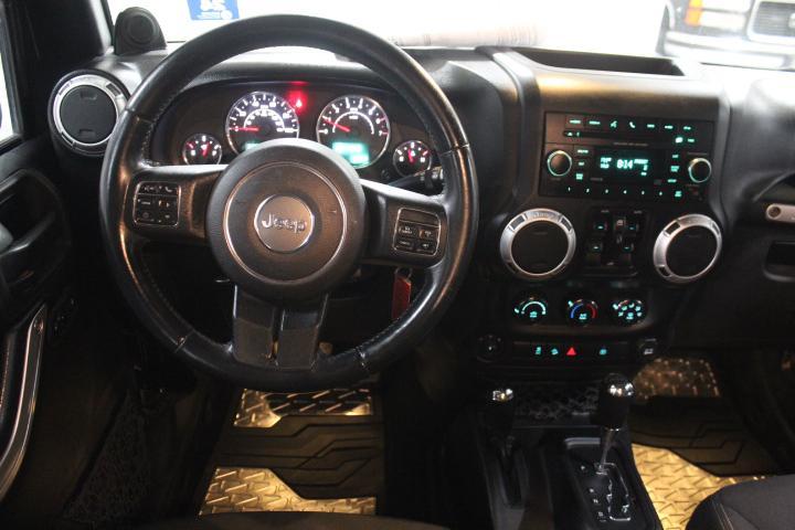 used 2013 Jeep Wrangler Unlimited car, priced at $16,435