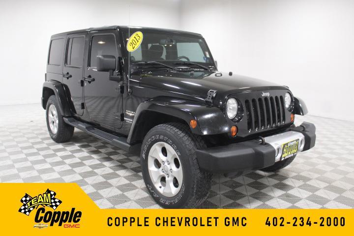 used 2013 Jeep Wrangler Unlimited car, priced at $16,635