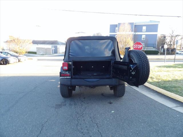 used 2012 Jeep Wrangler Unlimited car, priced at $13,995