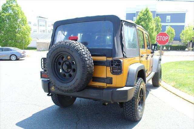 used 2014 Jeep Wrangler Unlimited car, priced at $17,995