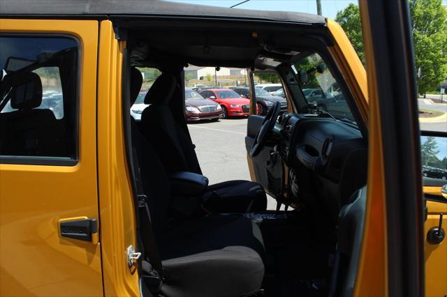 used 2014 Jeep Wrangler Unlimited car, priced at $17,995