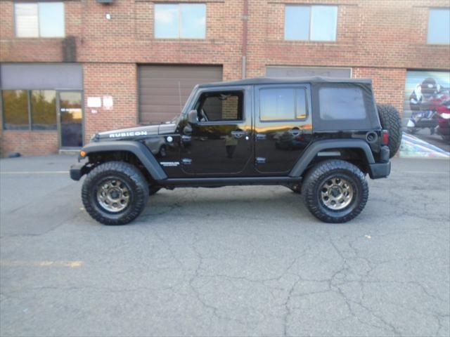 used 2015 Jeep Wrangler Unlimited car, priced at $20,995