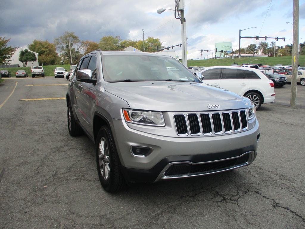 used 2014 Jeep Grand Cherokee car, priced at $22,995