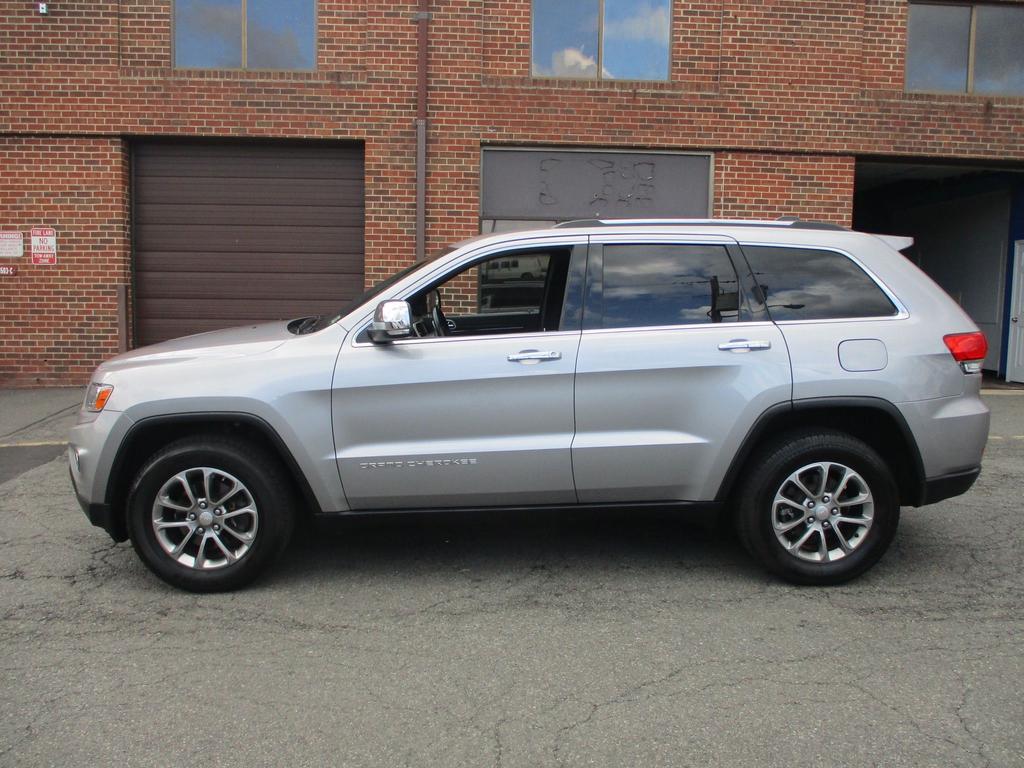 used 2014 Jeep Grand Cherokee car, priced at $22,995