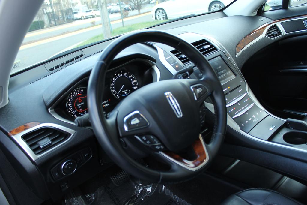 used 2015 Lincoln MKZ car, priced at $13,995