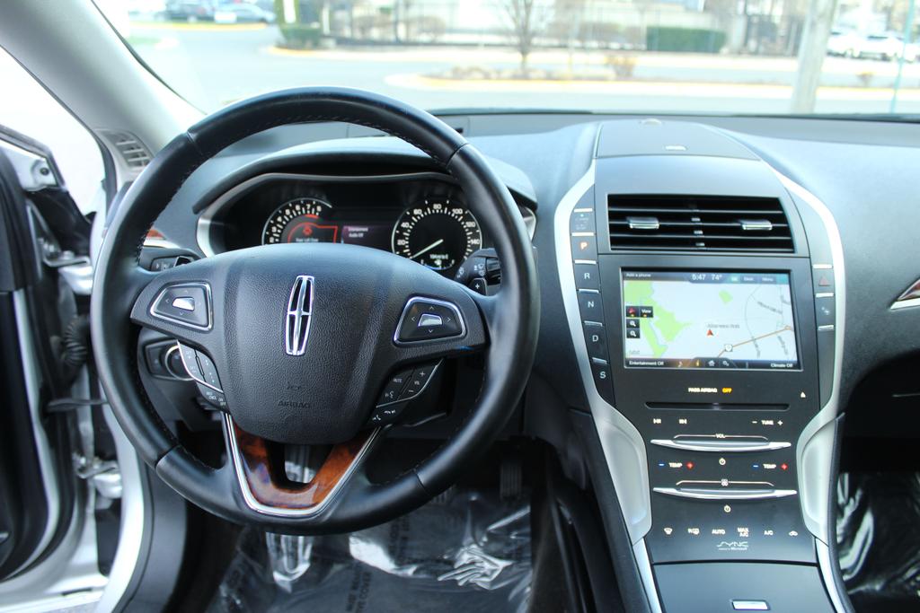 used 2015 Lincoln MKZ car, priced at $13,995