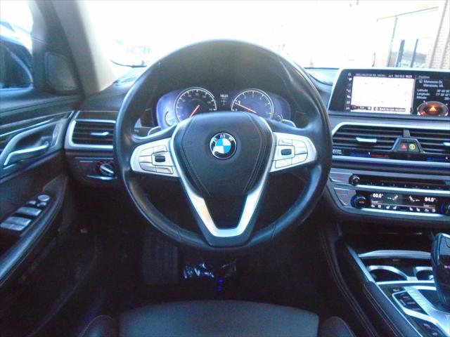 used 2016 BMW 750 car, priced at $25,995