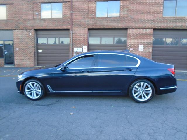 used 2016 BMW 750 car, priced at $25,995