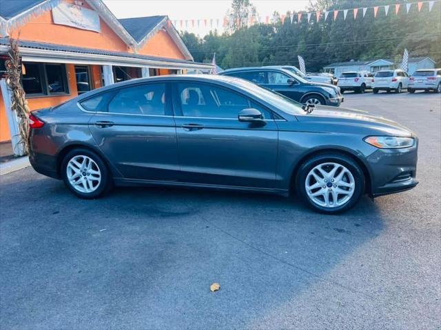 used 2016 Ford Fusion car, priced at $12,995