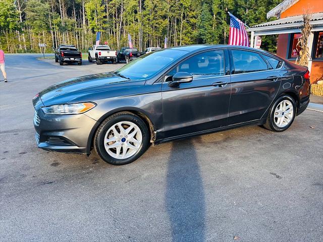 used 2016 Ford Fusion car, priced at $7,995