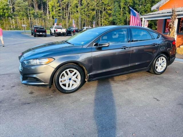 used 2016 Ford Fusion car, priced at $12,995