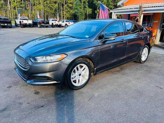 used 2016 Ford Fusion car, priced at $12,995