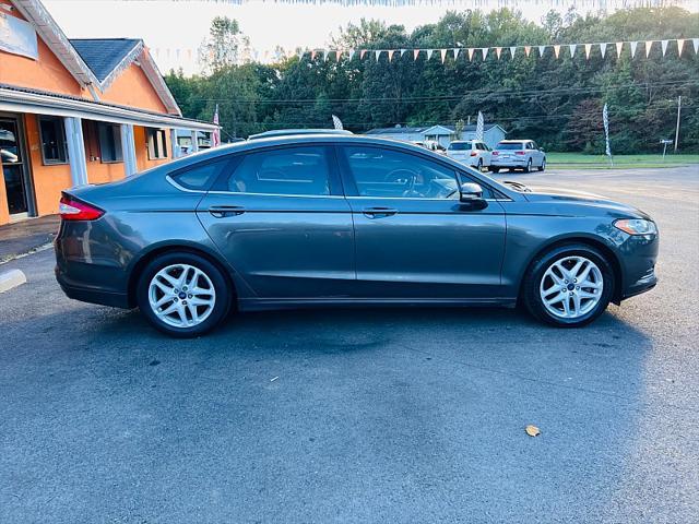 used 2016 Ford Fusion car, priced at $7,995