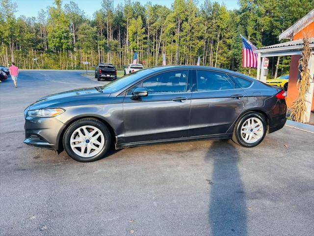 used 2016 Ford Fusion car, priced at $12,995