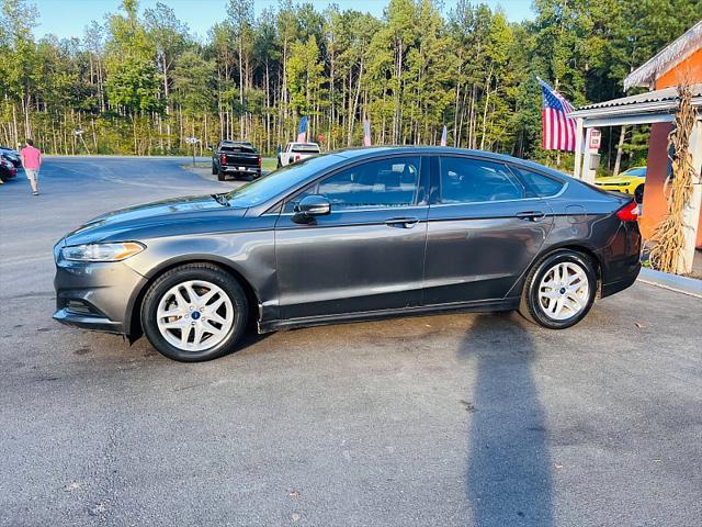 used 2016 Ford Fusion car, priced at $7,995