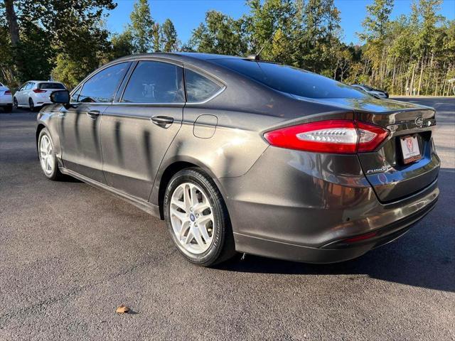 used 2016 Ford Fusion car, priced at $12,995