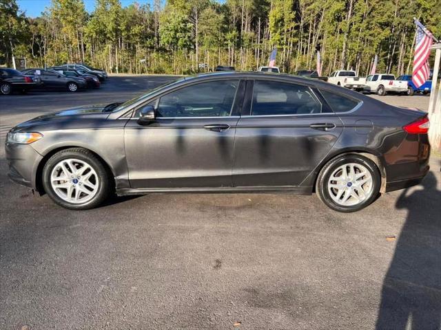 used 2016 Ford Fusion car, priced at $12,995