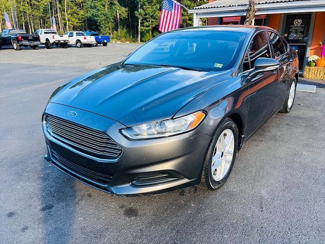 used 2016 Ford Fusion car, priced at $7,995