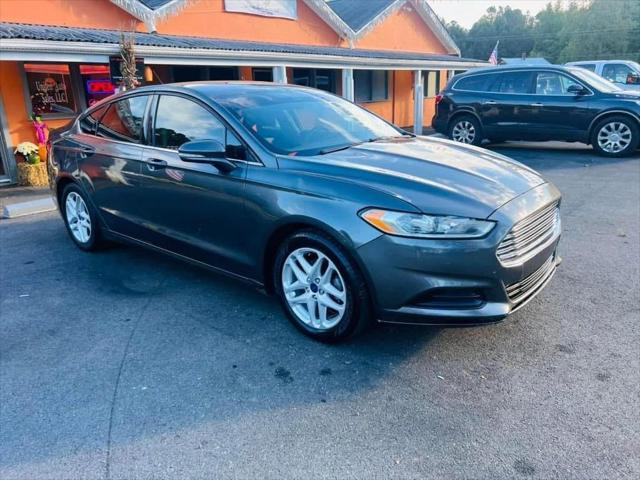 used 2016 Ford Fusion car, priced at $12,995