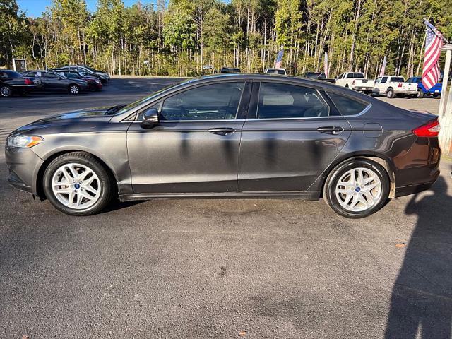 used 2016 Ford Fusion car, priced at $7,995