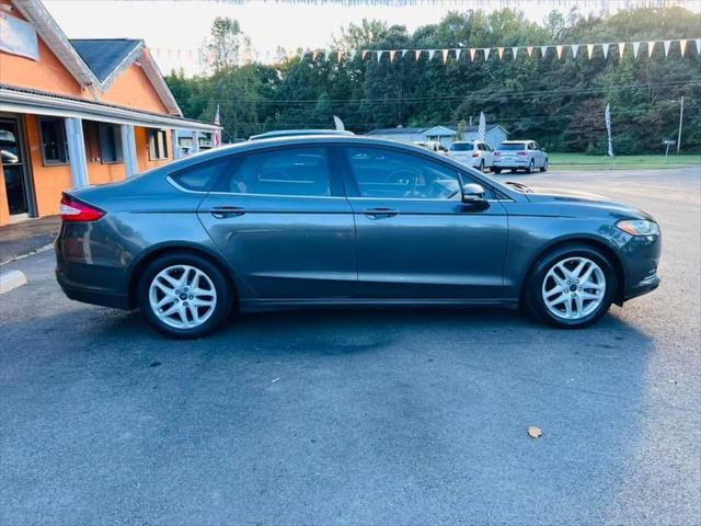 used 2016 Ford Fusion car, priced at $12,995