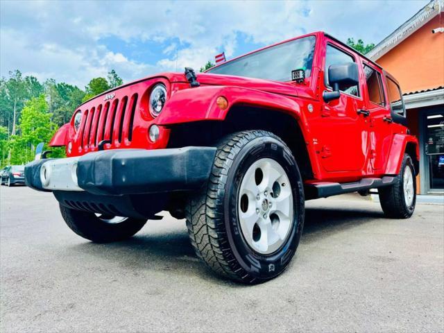 used 2015 Jeep Wrangler Unlimited car, priced at $12,995