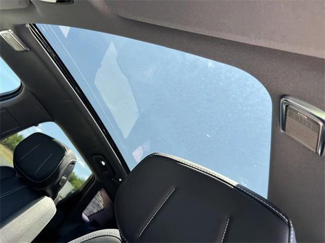 new 2025 Cadillac OPTIQ car, priced at $56,215